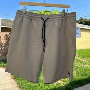 Volcom Tan Shorts with Black Logo Patch